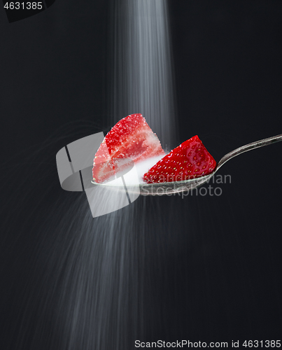 Image of spoon of strawberry pieces