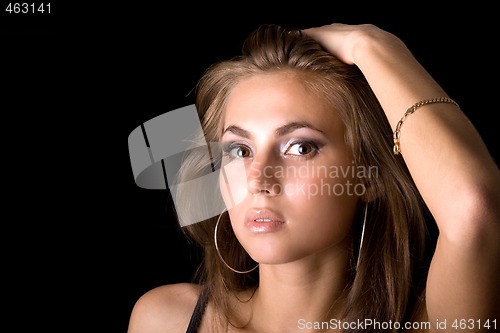 Image of portrait of the young beauty woman. Isolated on black 2