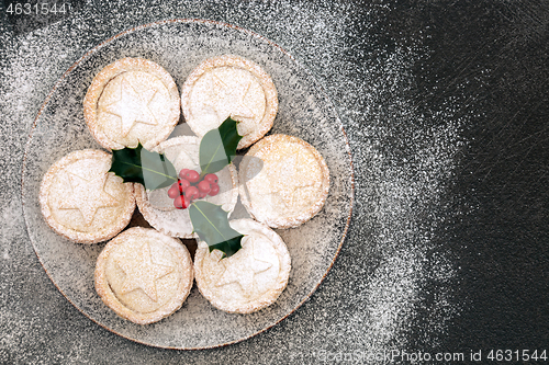Image of Christmas Mince Pies with Holly and Icing Sugar