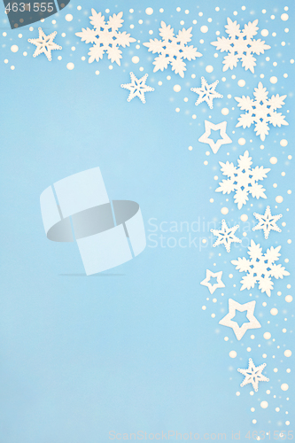 Image of Abstract Christmas Snowflake Background Border on Pastel Blue