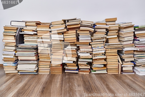 Image of Wall of books piled up