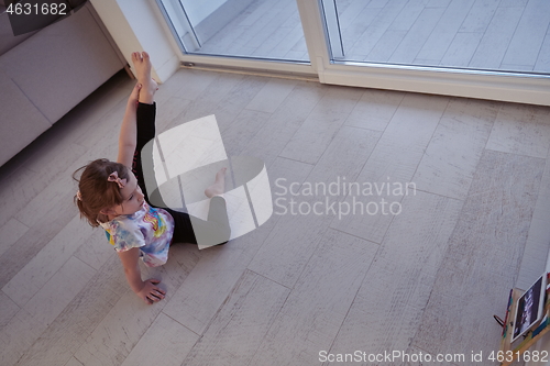 Image of girl online education ballet class at home