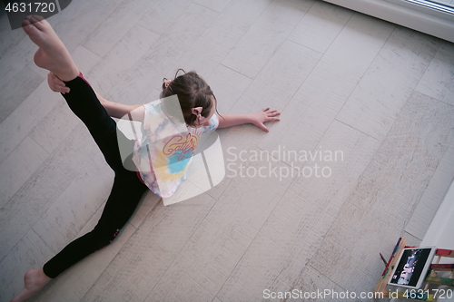 Image of girl online education ballet class at home top view