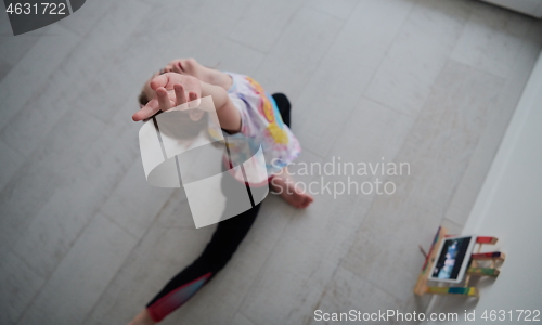 Image of girl online education ballet class at home top view