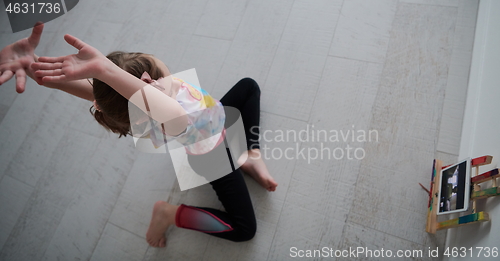 Image of girl online education ballet class at home top view