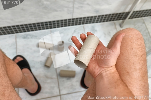 Image of Finding empty roll in the restroom