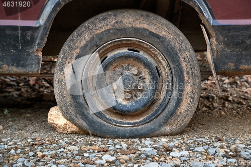 Image of Flat Tire on abandoned wreck