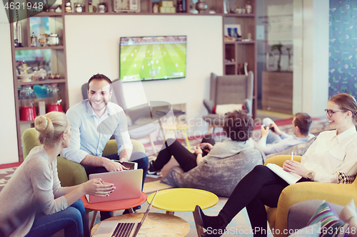 Image of Startup Business Team At A Meeting at modern office building