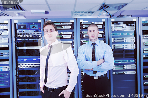 Image of it enineers in network server room