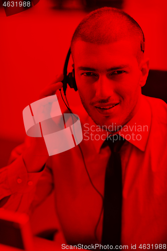 Image of businessman with a headset