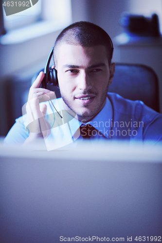 Image of businessman with a headset