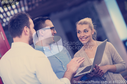 Image of Business team Working With laptop in creative office