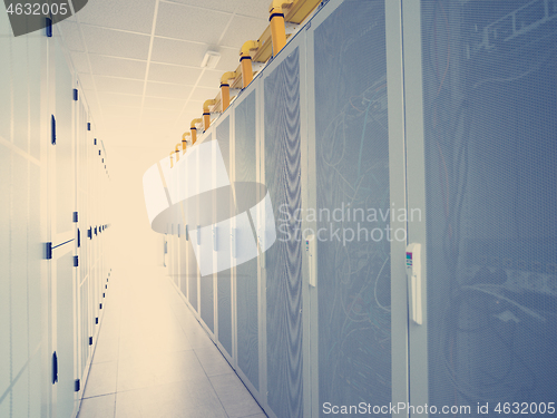 Image of modern server room with white servers