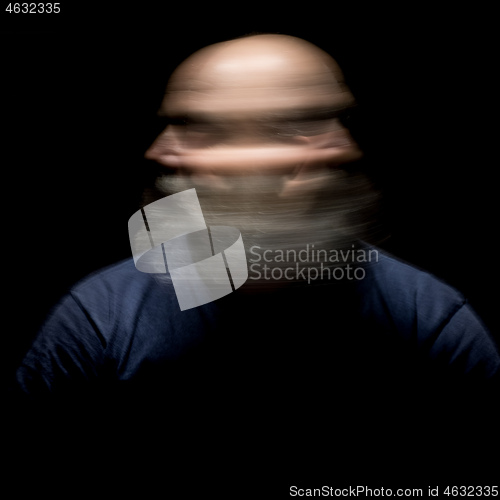 Image of bearded man motion blur portrait