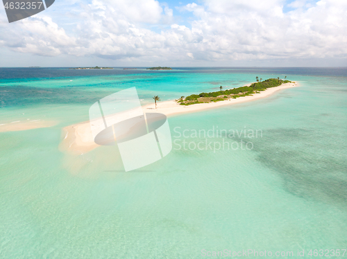 Image of Picture perfect beach and turquoise lagoon on small tropical island on Maldives