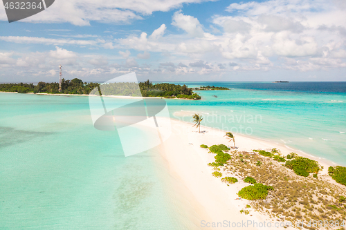 Image of Picture perfect beach and turquoise lagoon on small tropical island on Maldives