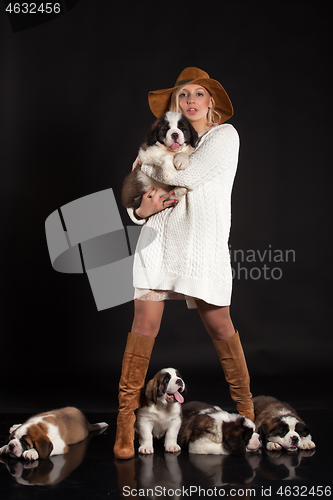 Image of Young WOman And Puppes