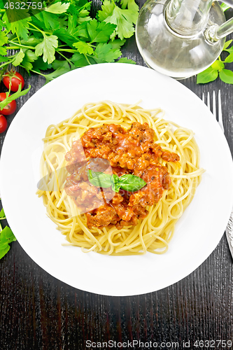 Image of Spaghetti with bolognese on black board top