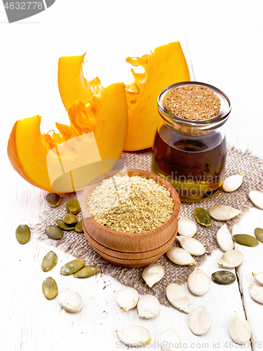 Image of Flour pumpkin in bowl on wooden board