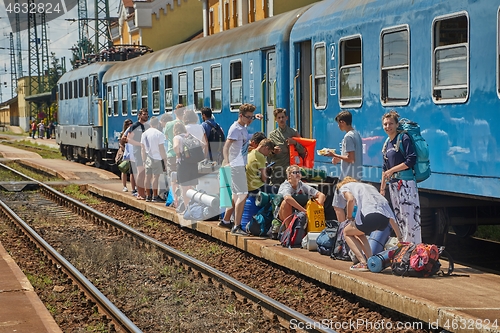 Image of Group of students boarding a train