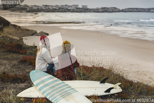 Image of Surfer girls at the beach