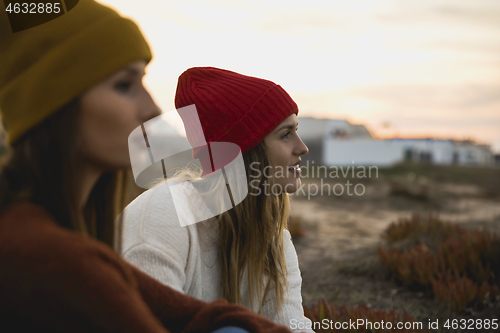 Image of Two girls enjoying  a day on the beach