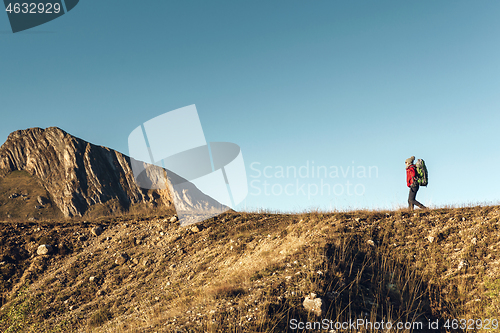 Image of Woman exploring the montains