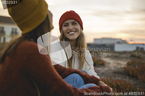 Image of Two girls enjoying  a day on the beach