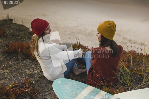 Image of Surfer girls at the beach