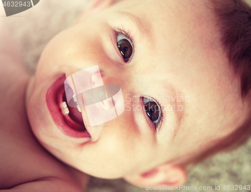 Image of close up of happy little baby boy or girl face