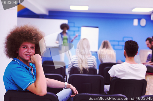 Image of Portrait of young informal businessman