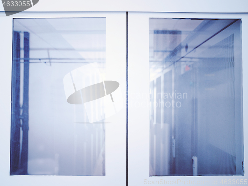 Image of modern server room with white servers