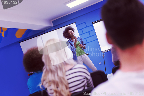 Image of Black woman Speaker Seminar Corporate Business Meeting Concept