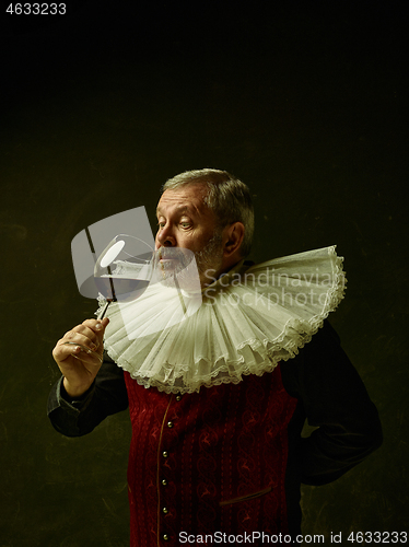 Image of Official portrait of historical governor from the golden age. Studio shot against dark wall.