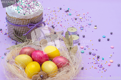 Image of horizontal photo of the compilation for Easter with cake and painted eggs