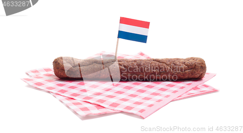 Image of One frikadel on a napkin, a Dutch fast food snack