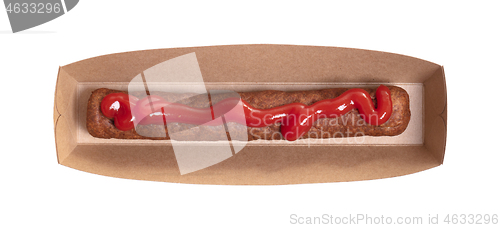 Image of One frikadel with ketchup, a Dutch fast food snack