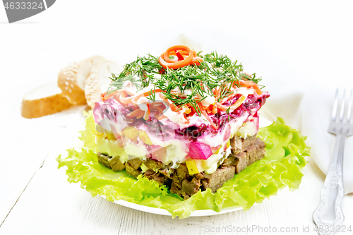 Image of Salad with beef and vegetables on white board