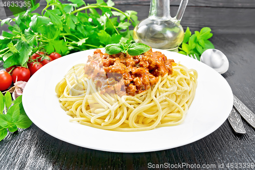 Image of Spaghetti with bolognese on black board