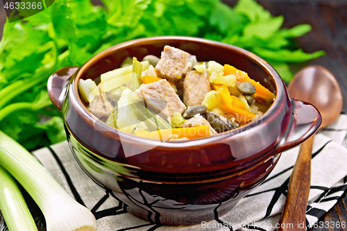 Image of Soup Eintopf in clay bowl on towel