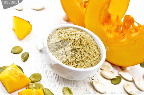 Image of Flour pumpkin in white bowl on light board