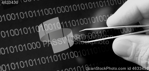 Image of Binary code, password vulnerability taking out with tweezers