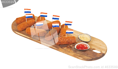 Image of Brown crusty dutch kroketten on a serving tray isolated 