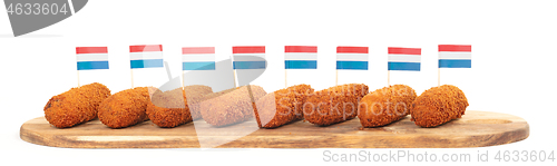 Image of Brown crusty dutch kroketten on a serving tray isolated 