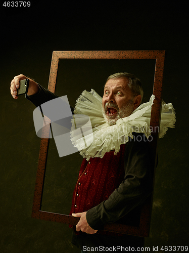 Image of Official portrait of historical governor from the golden age. Studio shot against dark wall.