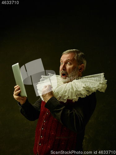 Image of Official portrait of historical governor from the golden age. Studio shot against dark wall.