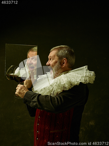 Image of Official portrait of historical governor from the golden age. Studio shot against dark wall.