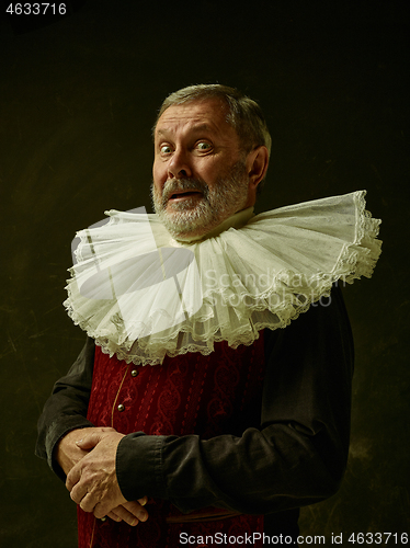 Image of Official portrait of historical governor from the golden age. Studio shot against dark wall.