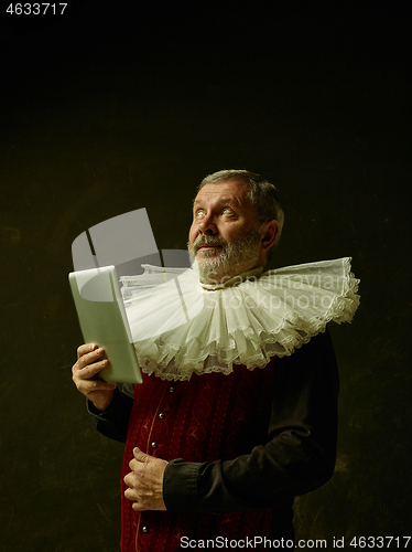 Image of Official portrait of historical governor from the golden age. Studio shot against dark wall.