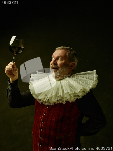 Image of Official portrait of historical governor from the golden age. Studio shot against dark wall.